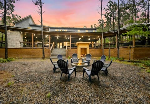 Cozy up around the fire pit with seating for eight, perfect for roasting marshmallows and sharing stories under the stars.