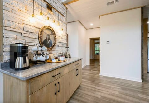 Start your day with a fresh cup of coffee from the well-stocked coffee bar, complete with a Keurig machine.