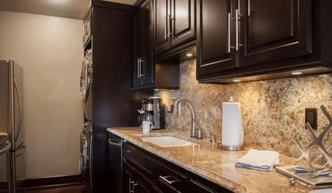 Complete with modern appliances and granite countertops, ready for your culinary adventures.