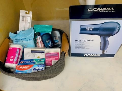 Hair dryer, towels, soap, shampoo