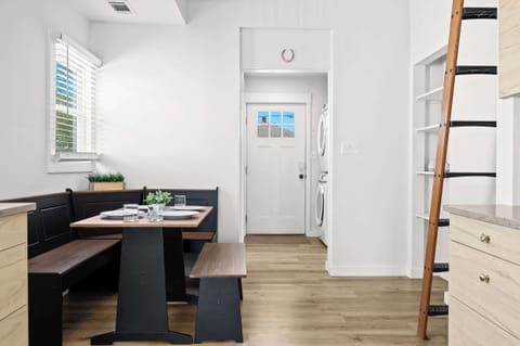 Dining Area: Gather around this stylish dining area — the perfect spot for shared meals, meaningful conversations, and making memories during your stay.