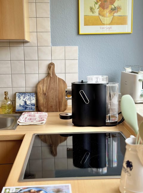 Fridge, coffee/tea maker, electric kettle, toaster