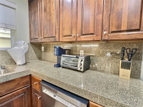 The kitchen is fully stocked with all the essentials to prepare delicious meals effortlessly!