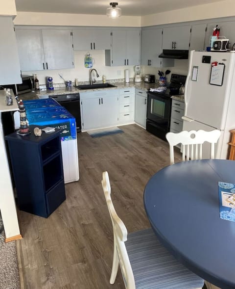 The kitchen is pretty spacious and stocked with most everything you'll need!