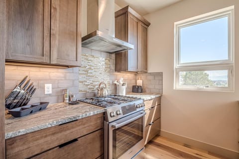 Step into a chef’s dream kitchen, where brand-new stainless steel appliances and high-end finishes create a perfect blend of style and function.