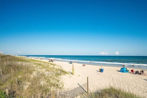 On the beach, sun loungers, beach towels