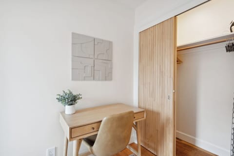 Bedroom with an designated working area, where you can focus and work efficiently if needed.