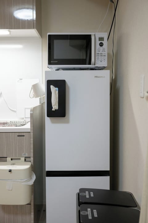 Fridge, microwave, cookware/dishes/utensils