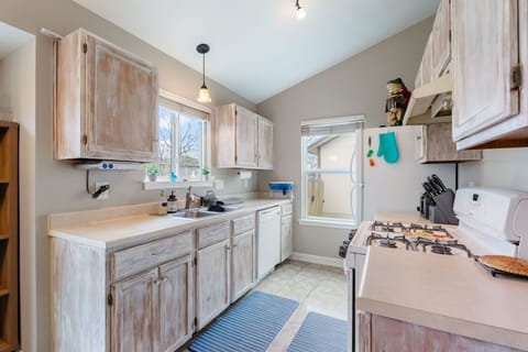 The tranquil kitchen offers ample space & all the comforts of home