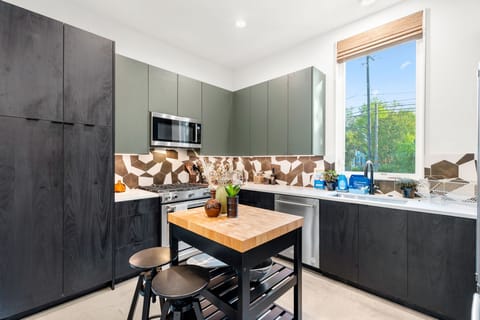 The updated kitchen offers ample space & all the comforts of home