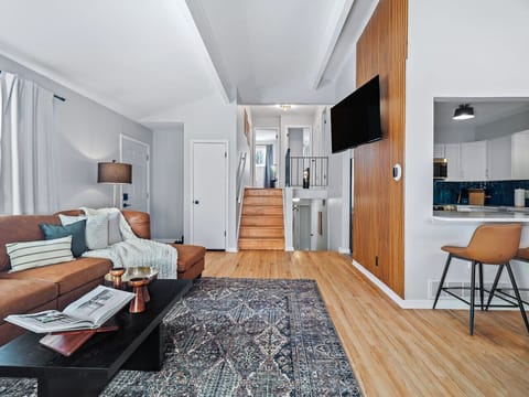 A warm and inviting atmosphere.  The natural light and neutral tones create a tranquil space.