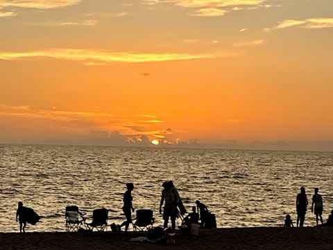 On the beach, sun loungers, beach towels