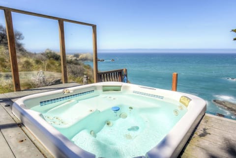 Hot tub with panoramic ocean views