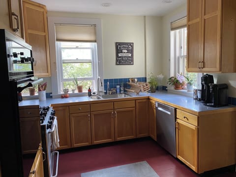 Well appointed kitchen with many appliances.