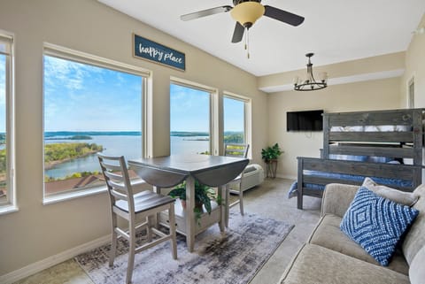 Four-season room with Twin/Full bunk bed love seat, and table (main floor)