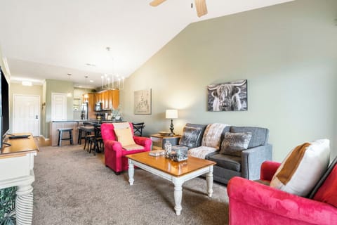 Bright living space with sofa sleeper and TV