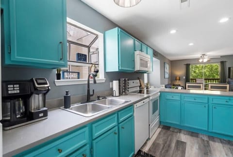 Stay connected during your stay with the open-concept layout in the Kitchen and Living/Dining Areas