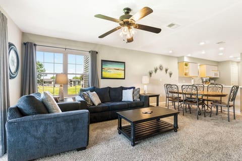 Cozy and spacious living area with TV