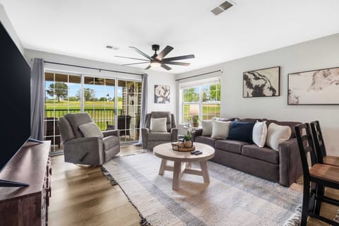 Bright airy living space with sofa sleeper and Smart tv.