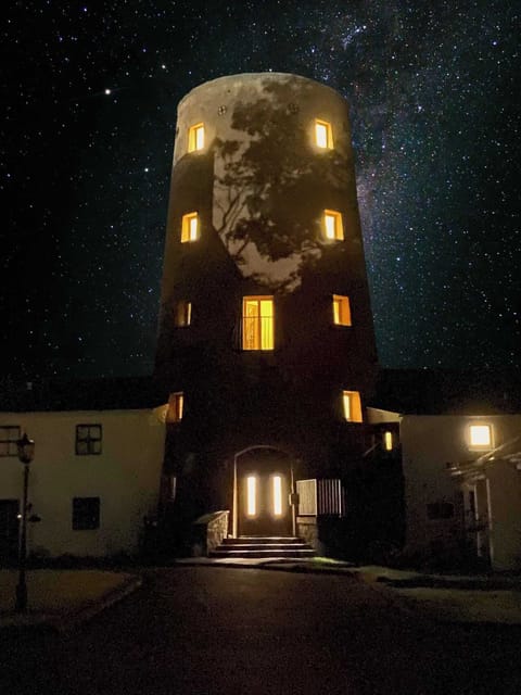 Add a pinch of spookiness to your holidays by watching the Witches Mill in a starry night