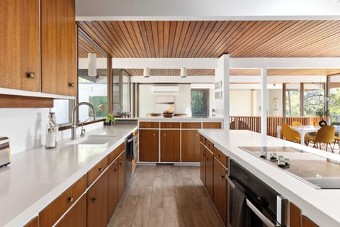 Enjoy our fully-equipped chef's kitchen, complete with brand new appliances including a microwave, garbage disposal, and full-size oven. You'll also find a spacious pantry and a convenient full-size washer and dryer. Feel at home and prepare meals with ease in this well-appointed space