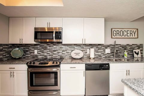 Feel at home with granite counters and stainless appliances!