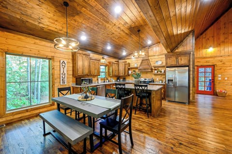 Enjoy meals and moments in this rustic kitchen and dining area, designed for comfort and connection