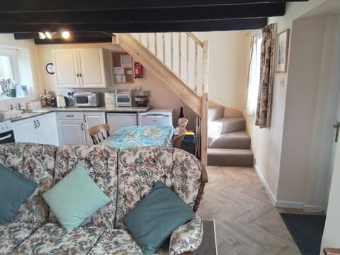 Lounge and kitchen area with sofa