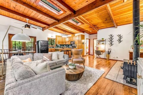 Open concept living/dining rooms and kitchen with work space.