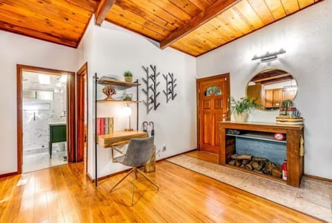 A stylish "working" desk, chair, and easy spot for your laptop in the living room.