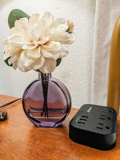 Each side table has a multiport charging station