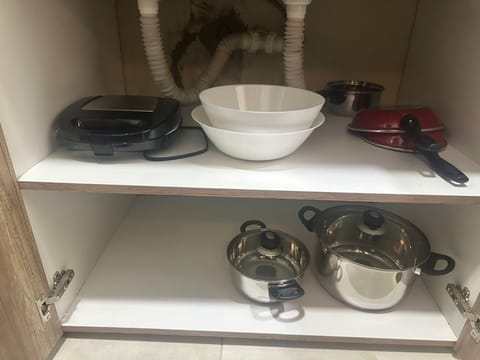 Microwave, stovetop, cookware/dishes/utensils, spices