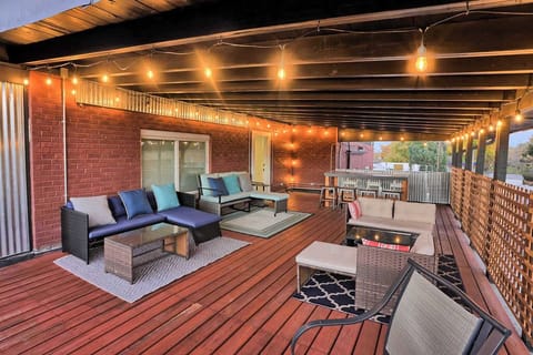 Rooftop Deck: Unwind under twinkling lights with stunning views and stylish seating!
