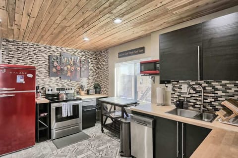 Apartment 1 has a full kitchen with a stove, dishwasher and full sized refrigerator.