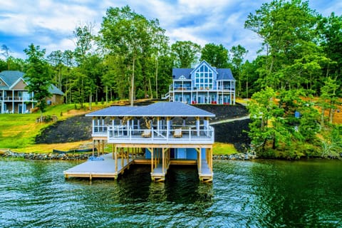 Stunning lakefront property with a spacious boathouse and beautiful views, perfect for a relaxing getaway