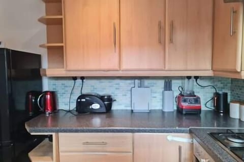 Fridge, dishwasher, cookware/dishes/utensils, dining tables