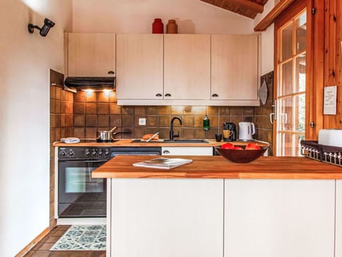 Cabinetry, Countertop, Property, Kitchen Appliance, Kitchen Stove, Kitchen, Tap, Wood, Home Appliance, Kitchen Sink