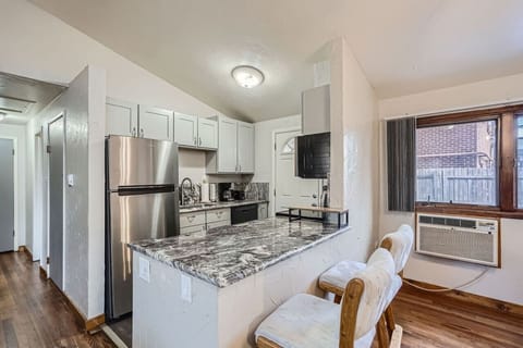 The remodeled kitchen has granite countertops, stainless steel appliances, and all the essentials you'll need for your stay