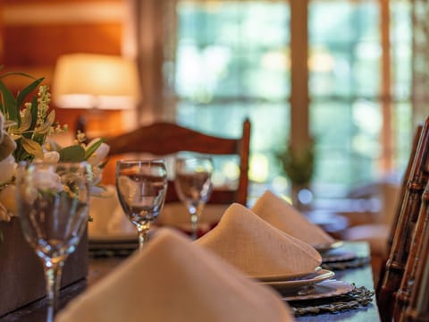 Rustic dining table with forest views