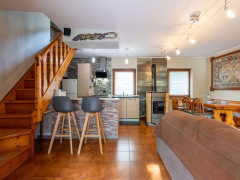 Furniture, Interior Design, Flooring, Wood, Ceiling, Floor, Room, Couch, Table, Lighting