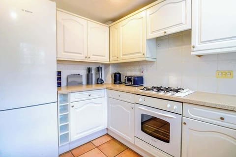 Fridge, microwave, oven, cookware/dishes/utensils