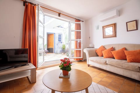 Comfortable Sitting Room With View Out To Courtyard