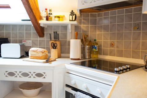 Kitchen with electric hob and oven