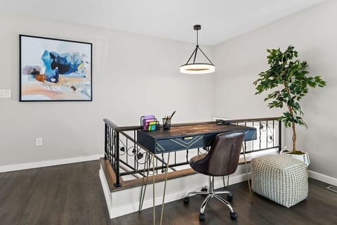 There is a lovely desk and chair in the living area so you can work from home!
