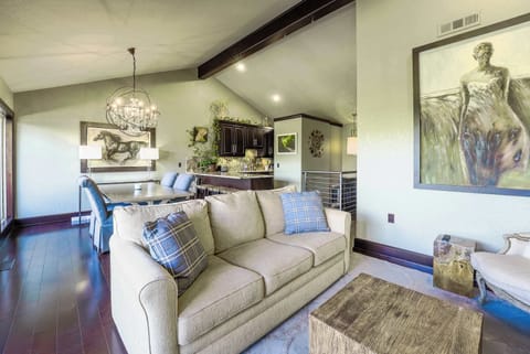 Experience elegance with our stylish living and dining area, featuring sophisticated furnishings and artful décor.