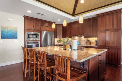 A well-equipped kitchen with modern appliances, perfect for preparing meals.