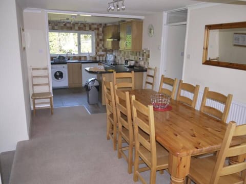 Large indoor dining table and chairs.