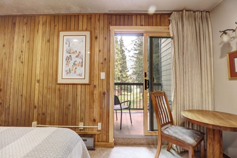 Bedroom #2 also offers a private balcony with great wooded views.