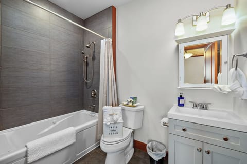 Jetted tub, hair dryer, towels, soap