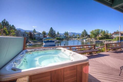 Main Level- Hot tub with views of the boat dock